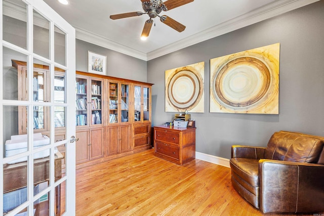 4 Bellegarde Dr, Little Rock, AR 72223 - sitting room featuring wood finished floors, crown molding, ceiling fan, and baseboards