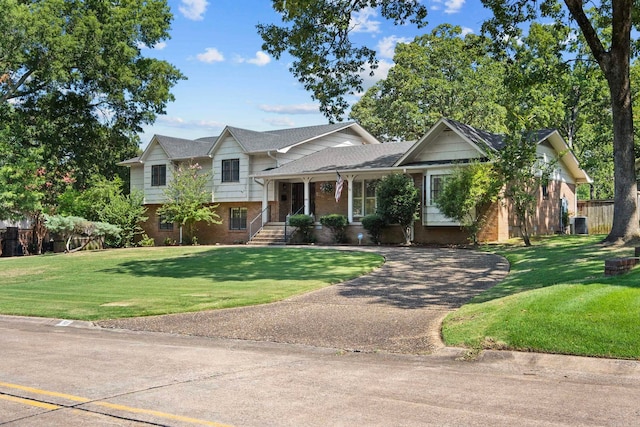 50 Heritage Park Cir, North Little Rock, AR 72116 - tri-level home with brick siding, driveway, a front yard, and a porch