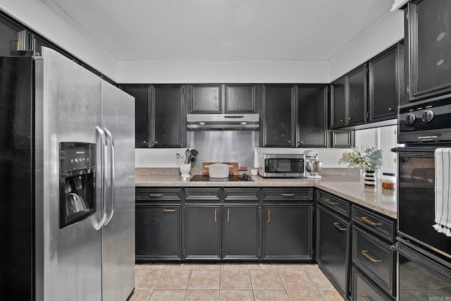 50 Heritage Park Cir, North Little Rock, AR 72116 - kitchen featuring black appliances, under cabinet range hood, dark cabinetry, light tile patterned floors, and a textured ceiling