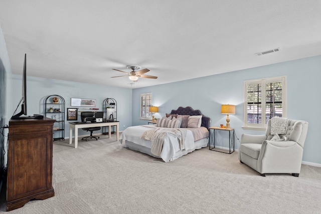 50 Heritage Park Cir, North Little Rock, AR 72116 - bedroom featuring light carpet, an office area, a ceiling fan, and baseboards