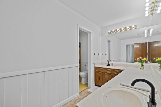 50 Heritage Park Cir, North Little Rock, AR 72116 - full bathroom featuring toilet, double vanity, and tile patterned floors