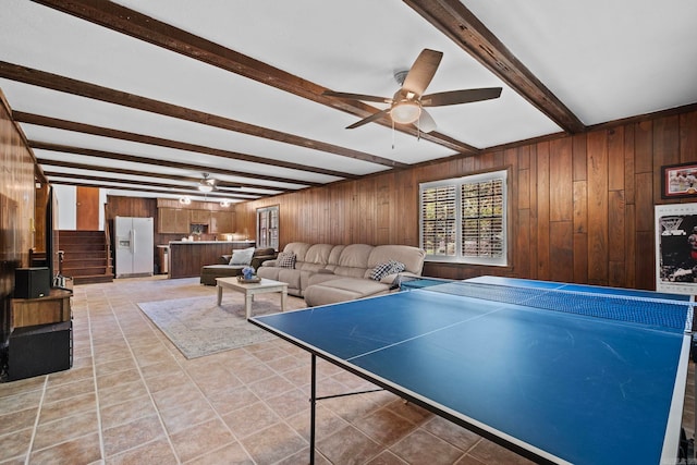 50 Heritage Park Cir, North Little Rock, AR 72116 - recreation room with a ceiling fan, beam ceiling, wood walls, and light tile patterned floors