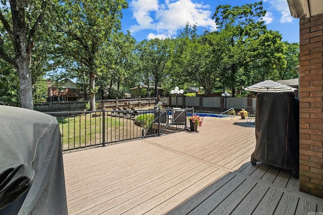50 Heritage Park Cir, North Little Rock, AR 72116 - wooden terrace featuring a fenced backyard and area for grilling