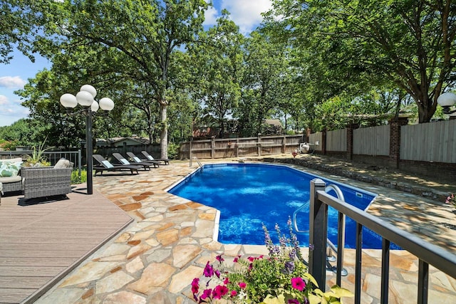 50 Heritage Park Cir, North Little Rock, AR 72116 - view of pool with a fenced backyard, a deck, and a patio