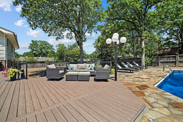 50 Heritage Park Cir, North Little Rock, AR 72116 - deck with outdoor lounge area, a fenced backyard, and a patio area
