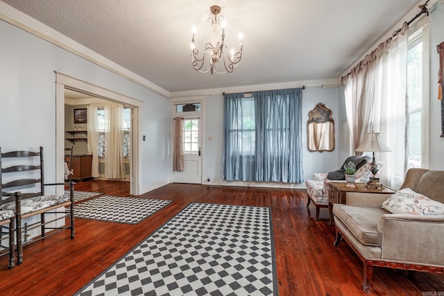321 Hazel St, Hot Springs, AR 71901 - sitting room with hardwood / wood-style floors, a chandelier, and a textured ceiling