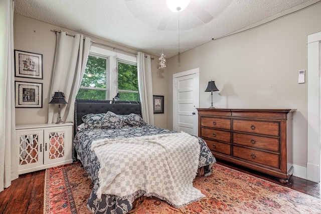 321 Hazel St, Hot Springs, AR 71901 - bedroom with wood finished floors, a textured ceiling, and ceiling fan