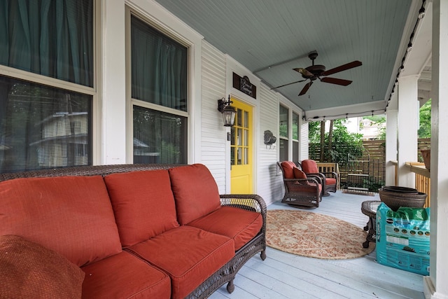 321 Hazel St, Hot Springs, AR 71901 - porch with an outdoor hangout area and ceiling fan