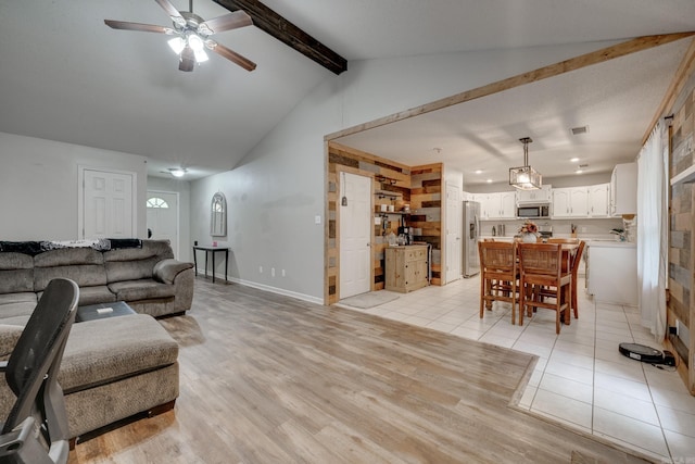 306 Ray St, Cabot, AR 72023 - living room featuring ceiling fan, light wood-style flooring, and baseboards