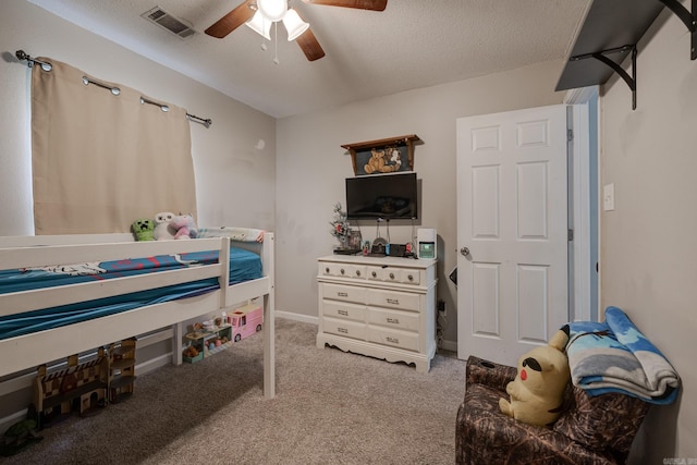306 Ray St, Cabot, AR 72023 - carpeted bedroom featuring a textured ceiling and ceiling fan
