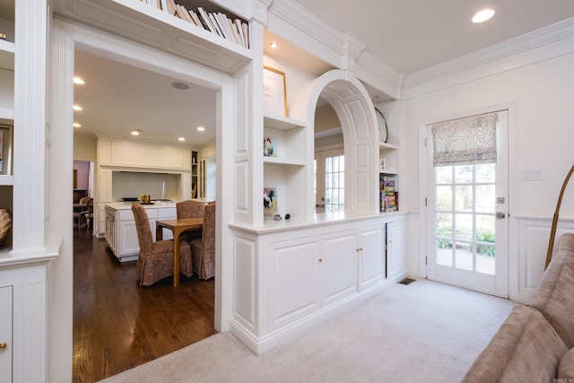 148 Pleasant Valley Dr, Little Rock, AR 72212 - entrance foyer featuring ornamental molding, a decorative wall, wood finished floors, wainscoting, and recessed lighting