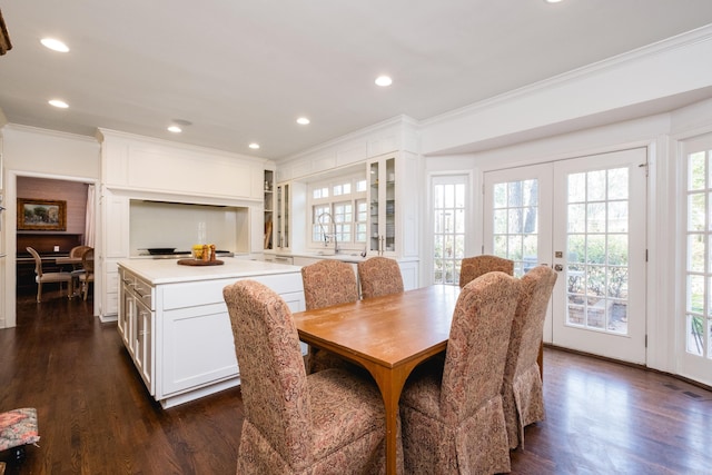 148 Pleasant Valley Dr, Little Rock, AR 72212 - dining room featuring crown molding, french doors, healthy amount of natural light, dark wood finished floors, and recessed lighting