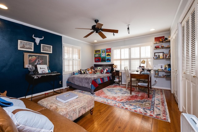 148 Pleasant Valley Dr, Little Rock, AR 72212 - bedroom with ornamental molding, multiple windows, wood finished floors, a desk, and baseboards