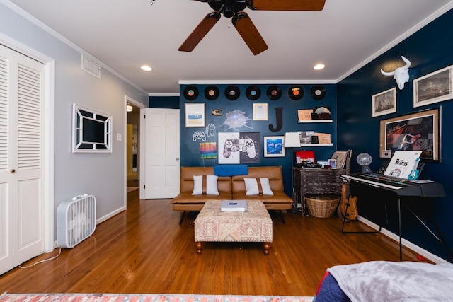 148 Pleasant Valley Dr, Little Rock, AR 72212 - living area featuring ornamental molding, wood finished floors, ceiling fan, recessed lighting, and baseboards