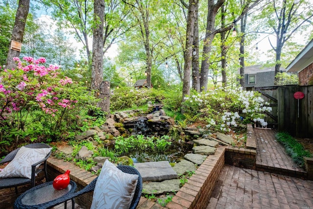 148 Pleasant Valley Dr, Little Rock, AR 72212 - view of yard featuring a patio area