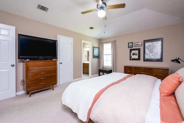 2418 Hickorynut Ct, Little Rock, AR 72211 - bedroom featuring light colored carpet, baseboards, ensuite bath, and a ceiling fan