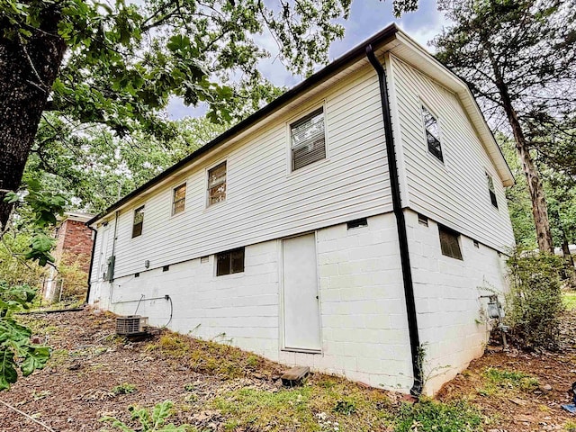 704 W 56th St, North Little Rock, AR 72118 - back of property with central air condition unit