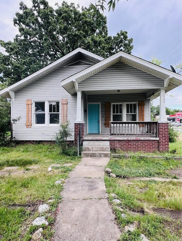 1700 Moss St, North Little Rock, AR 72114 - bungalow-style house featuring a porch