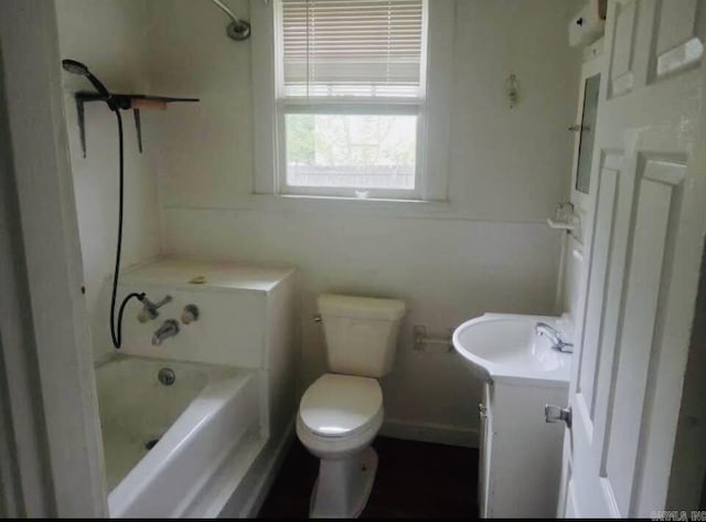 1700 Moss St, North Little Rock, AR 72114 - full bath with vanity, toilet, and shower / washtub combination