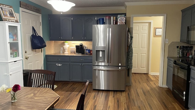 131 Sunny Gap, Conway, AR 72032 - kitchen featuring black appliances, decorative backsplash, crown molding, dark wood-style flooring, and gray cabinets
