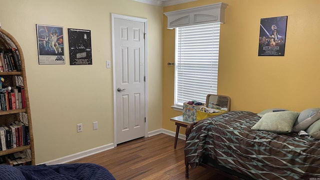 131 Sunny Gap, Conway, AR 72032 - bedroom with wood finished floors, crown molding, and baseboards