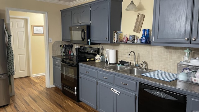 131 Sunny Gap, Conway, AR 72032 - kitchen with black appliances, a sink, crown molding, dark countertops, and backsplash