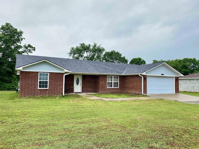 192 Shady Grove, Clarksville, AR 72830 - single story home featuring concrete driveway, a garage, brick siding, and a front lawn