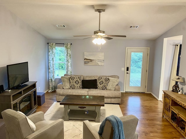 192 Shady Grove, Clarksville, AR 72830 - living room featuring wood finished floors, baseboards, and ceiling fan
