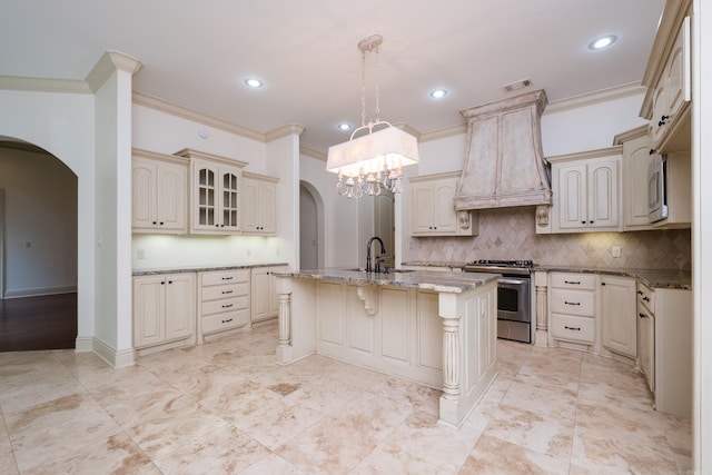 28 Talmont Pl, Little Rock, AR 72223 - kitchen featuring stainless steel gas range oven, arched walkways, a sink, premium range hood, and ornamental molding