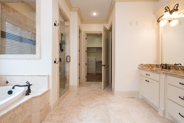 28 Talmont Pl, Little Rock, AR 72223 - full bath featuring a stall shower, a garden tub, a spacious closet, vanity, and ornamental molding