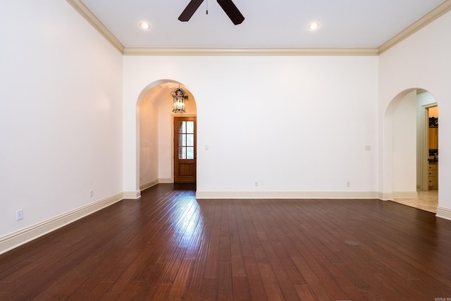 28 Talmont Pl, Little Rock, AR 72223 - spare room featuring arched walkways, ceiling fan, crown molding, dark wood-style floors, and baseboards