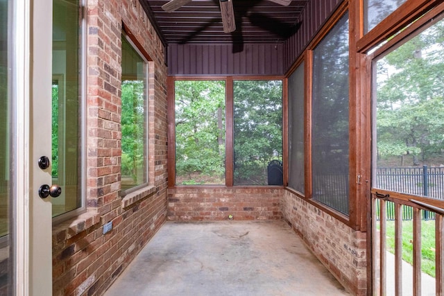 28 Talmont Pl, Little Rock, AR 72223 - unfurnished sunroom with a ceiling fan, unfinished concrete flooring, and brick wall