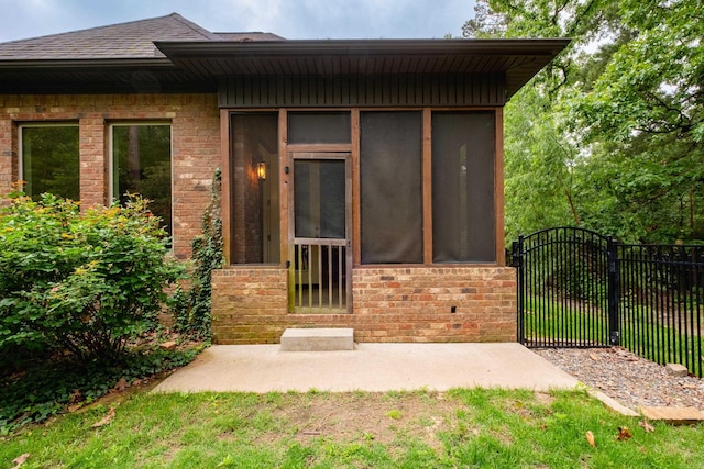 28 Talmont Pl, Little Rock, AR 72223 - entrance to property featuring brick siding, a gate, and a shingled roof