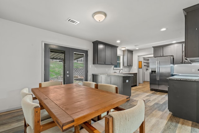 205 Michele St, Hot Springs, AR 71913 - dining room with french doors, light wood-type flooring, and recessed lighting