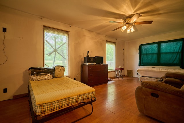 149 Firetower, Hardy, AR 72542 - bedroom featuring wood finished floors and ceiling fan