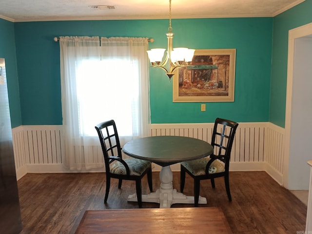 1000 Gum Springs Rd, Searcy, AR 72143 - dining area featuring wood finished floors, a chandelier, and crown molding
