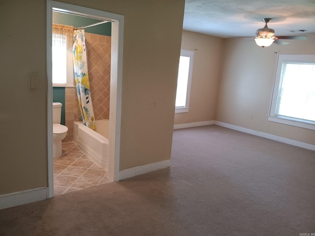 1000 Gum Springs Rd, Searcy, AR 72143 - spare room with plenty of natural light, light carpet, a ceiling fan, and baseboards
