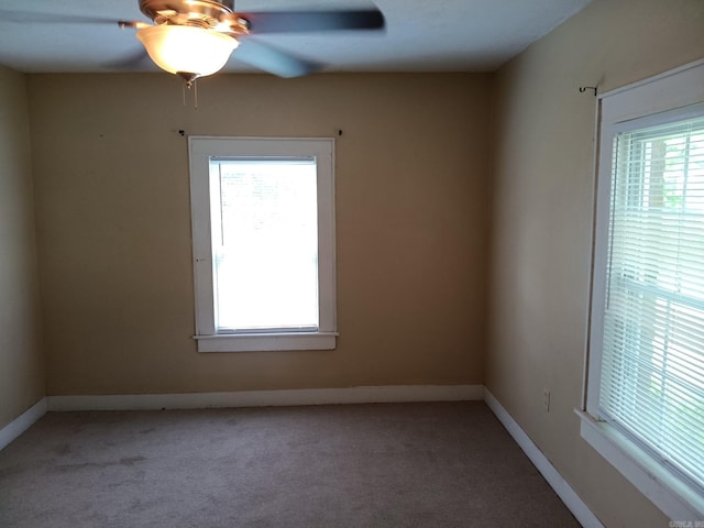 1000 Gum Springs Rd, Searcy, AR 72143 - empty room featuring a ceiling fan, light colored carpet, and baseboards
