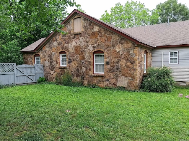 1000 Gum Springs Rd, Searcy, AR 72143 - rear view of house featuring stone siding, a gate, and roof with shingles