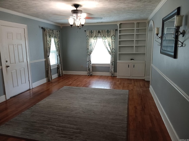 1000 Gum Springs Rd, Searcy, AR 72143 - unfurnished dining area featuring healthy amount of natural light, a ceiling fan, a textured ceiling, wood finished floors, and ornamental molding
