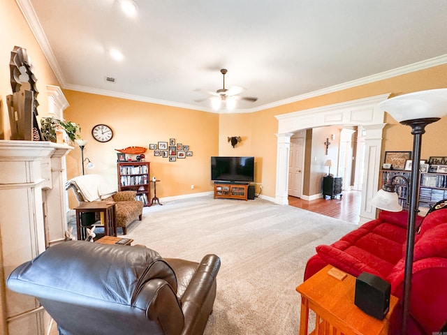 6 Palmer Ct, Searcy, AR 72143 - living area with ornamental molding, decorative columns, ceiling fan, carpet floors, and baseboards