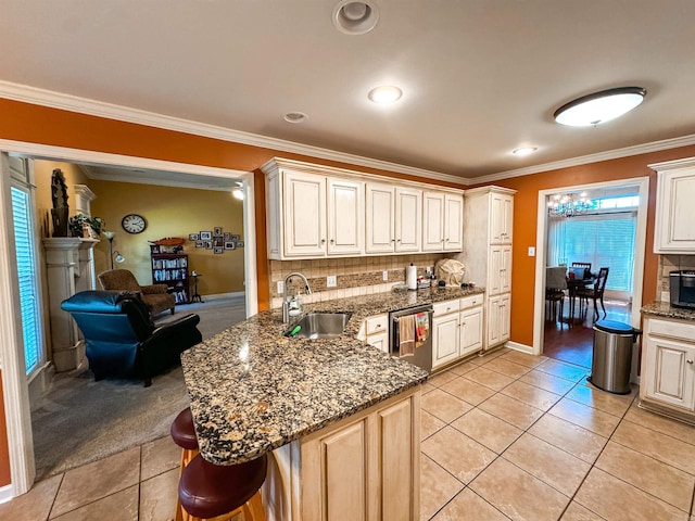 6 Palmer Ct, Searcy, AR 72143 - kitchen featuring a sink, stainless steel dishwasher, a peninsula, light tile patterned floors, and tasteful backsplash