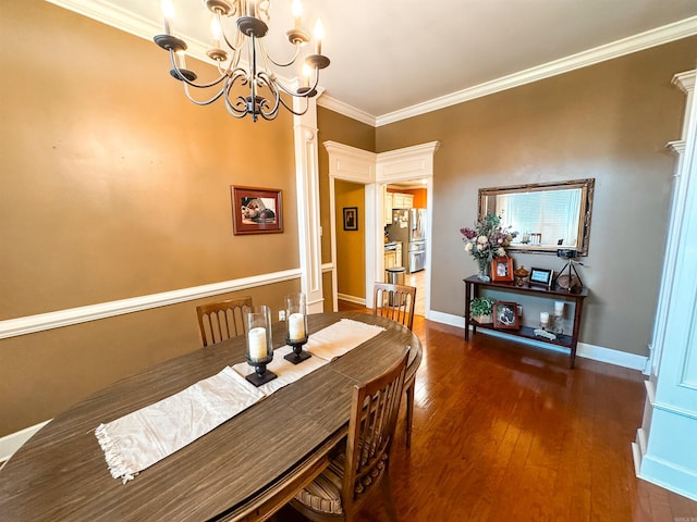 6 Palmer Ct, Searcy, AR 72143 - dining space with a chandelier, hardwood / wood-style floors, crown molding, decorative columns, and baseboards