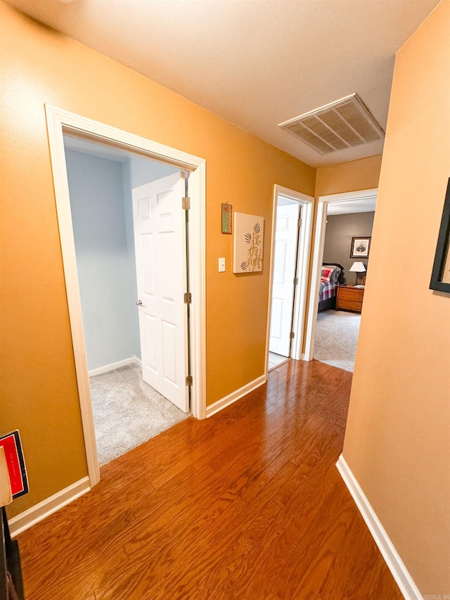 6 Palmer Ct, Searcy, AR 72143 - hallway with wood finished floors and baseboards
