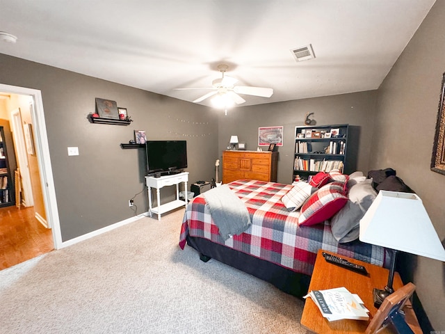 6 Palmer Ct, Searcy, AR 72143 - carpeted bedroom featuring baseboards and a ceiling fan