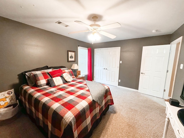 6 Palmer Ct, Searcy, AR 72143 - carpeted bedroom featuring ceiling fan, a closet, and baseboards
