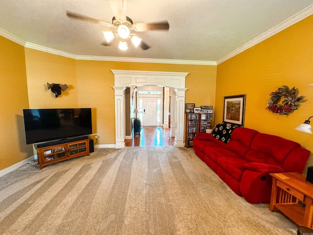 6 Palmer Ct, Searcy, AR 72143 - carpeted living area with ornate columns, ceiling fan, crown molding, baseboards, and a textured ceiling