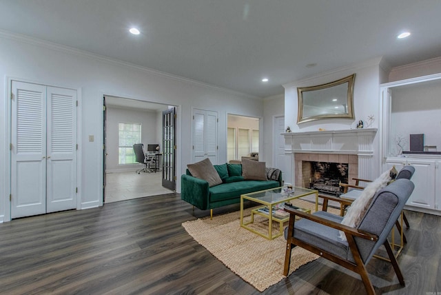 10 Silverwood Ct, North Little Rock, AR 72116 - living area featuring an office area, ornamental molding, dark wood-type flooring, recessed lighting, and a tile fireplace