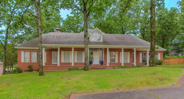 10 Silverwood Ct, North Little Rock, AR 72116 - view of front of property with brick siding, a chimney, and roof with shingles