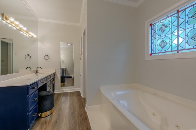 10 Silverwood Ct, North Little Rock, AR 72116 - full bath with wood finished floors, ornamental molding, a tub with jets, vanity, and baseboards